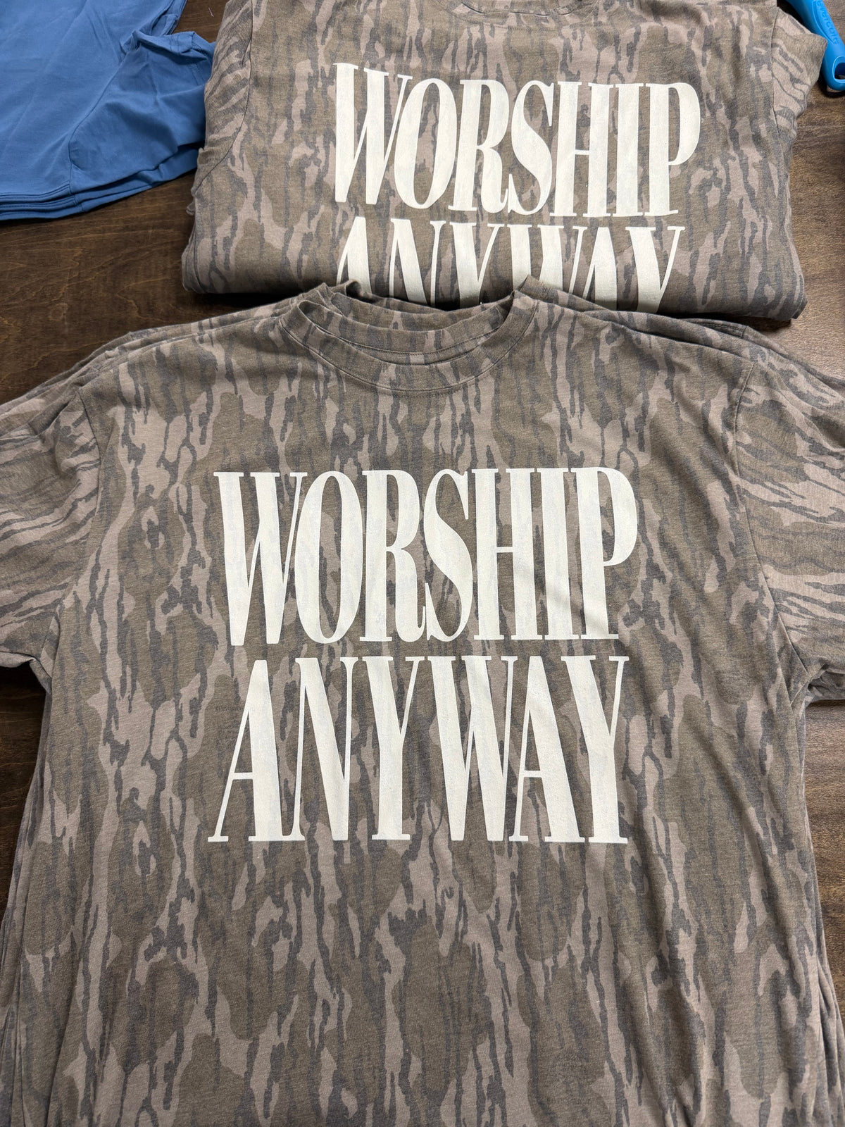 Worship Anyway tees in Mossy Oak Bottomland camo